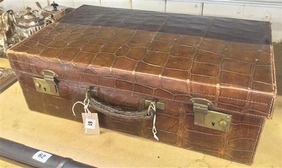 Crocodile skin suitcase